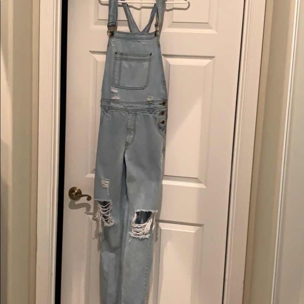 Ripped Jean overalls